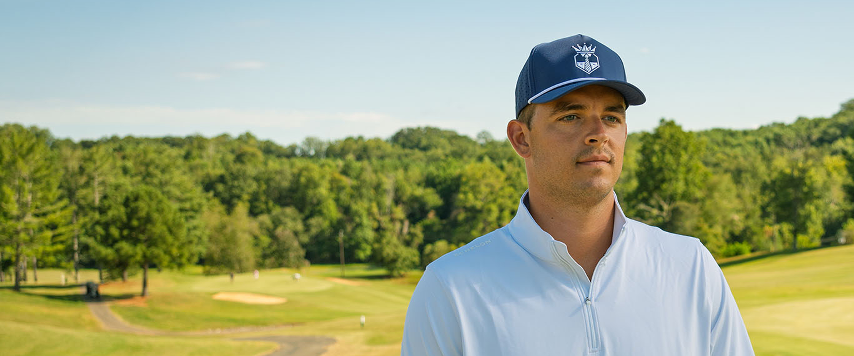 Feature-Quarter-zip-navy-hat-2880_x_1200.png