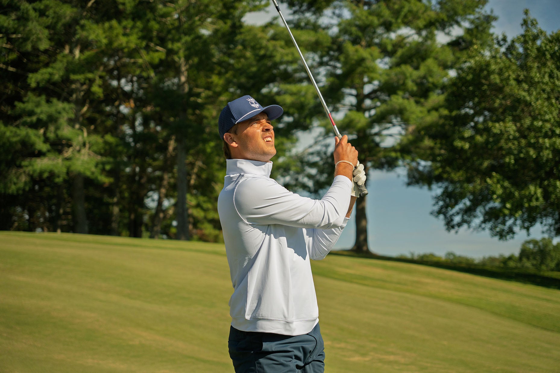 Echelon-041-Quarter-zip-white-navy-hat_-_Lifestyle.jpg